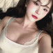 침대위에 누워있는 꽃빵 레이스 브라 가슴골